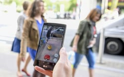 Person playing Pokemon Go on their smartphone xlarge